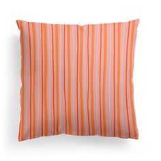 an orange and white striped pillow on a white background