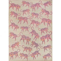 a pink and purple rug with zebras in the middle, on a white background