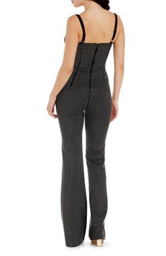 Dazzling dots cover every inch of this fun and flirty jumpsuit designed with a close fit and a bustier bodice. 61" length (size Small) Exposed back-zip closure Sweetheart neck Adjustable straps Partially lined 100% polyester Hand wash, dry flat Imported Chic Polka Dot Jumpsuits And Rompers For Party, Formal Fitted Strapless Jumpsuit For Party Season, Glamorous Fitted Strapless Sleeveless Jumpsuit, Fitted Strapless Jumpsuit For Party Season Evenings, Glamorous Black Fitted Strapless Jumpsuit, Designer Jumpsuits, Dress The Population, Sweetheart Neck, Black Silver