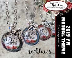 three necklaces with the words love is in the air