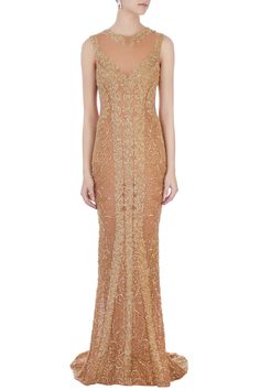 Gold gown with sequin embroidery and sheer detail.
Components: 1 
Neckline: Round
Sleeve length: Sleeveless
Keyhole back
Sheer panel
Closure: Back zip
 - Aza Fashions Trail Gown, Gowns Gold, Gown Gold, Gold Gown, Gown For Women, Sequin Embroidery, Gowns Online, Sequins Embroidery, Buy Gold