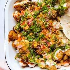 a white bowl filled with different types of food