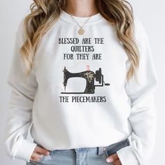 Blessed Are The Quilters For They Are The Piecemakers. Our Sweatshirt is perfect for quilters, seamstresses, and anyone who loves sewing. This unisex heavy blend crewneck sweatshirt is pure comfort.   UNISEX SIZING SO SWEATSHIRTS RUN BIG! PLEASE MEASURE YOUR FAVORITE SWEATSHIRT BEFORE ORDERING! WE WILL NOT ACCEPT RETURNS DUE TO SIZING ISSUES  Product Specs: *Ribbed knit collar helps retain its shape even after washing *50% cotton, 50% polyester *Medium-heavy fabric (8.0 oz/yd² (271.25 g/m *LOOSE Quilting Gifts, Quilted Sweatshirt, Quilted Gifts, Love Sewing, Knit Collar, Sew-in Labels, Heavy Fabric, Crewneck Sweatshirt, Ribbed Knit