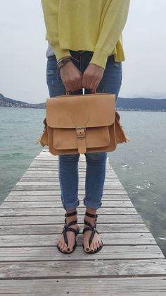 "Handmade Real Leather Camera Bag with padded interior , two side pockets and an adjustable shoulder strap Dimensions of the bags: 20×26×12 cm Strap Length: 127.0cm (50\") All Bags are made to order. If you like this bag, please see our full collection in the below link: https://www.etsy.com/shop/madammeshushusection_id=17490770&ref=shopsection_leftnav_3 Dear Visitor Welcome to my store where you will find simple, comfortable and absolutely stylish Greek Summer Sandals and colourful handbags Travel Canvas Satchel With Adjustable Strap, Handmade Leather Satchel Backpack, School Satchel Travel Bag With Adjustable Strap, Brown Satchel Shoulder Bag For Trip, Leather Satchel Backpack For Adventure, Saddle Bag Backpack With Adjustable Strap For Daily Use, Daily Use Saddle Bag Backpack With Adjustable Strap, School Shoulder Saddle Bag, Handmade Leather Satchel Backpack For Travel