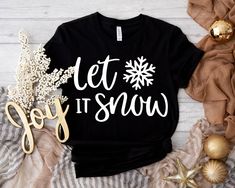 Let It Snow Shirt, Cute Winter T-Shirt, Lovely Xmas Shirt, Christmas Shirt, Christmas gift for Family, Happy New Year Tee,  Xmas Gift Tee SIZING AND COLORS Make sure you check our size-chart before you place your order. If you are not sure about sizing please measure your favorite t-shirt and compare measurements to the chart for the best fit for you. For detailed sizing information and t-shirt color options, please see listing images.   HOW TO ORDER 𝟏. Please, Check and Review all Photos. 𝟐. Winter Gift Shirt With Letter Print, Winter Letter Print Shirt For Gift, Winter Letter Print Shirt Gift, Graphic Print T-shirt For Gift In Winter, Pre-shrunk T-shirt As Winter Gift, Let It Snow Shirt, Christmas Gift For Family, Winter T Shirts, Xmas Shirts