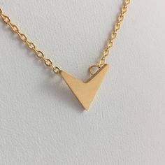 This Is A Brand New Stainless Steel Necklace With A "V" Shaped Pendant. The Approximate Measurements Of The Pendant Are: 1/2" X 1/2" Large. The Chain Is Cable Style With A Lobster Clasp And It Is 15" Long Plus It Has A 2" Extension. The Finished Weight Of The Whole Necklace Is 2 Grams. N0575 Necklace Ideas, Contemporary Minimalist, Gold Tone Necklace, Steel Necklace, Gold Plated Necklace, Stainless Steel Necklace, Jewelry Necklace, Men Necklace, V Shape