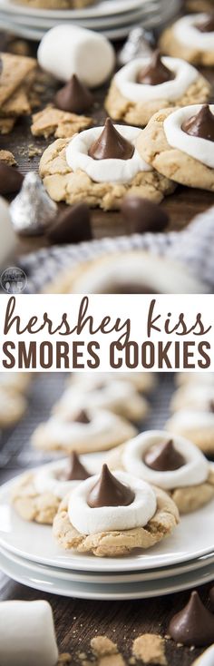 there are cookies with marshmallows on them and the words hershey kiss smores cookies