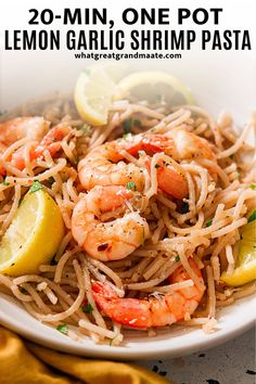 a white bowl filled with lemon garlic shrimp pasta