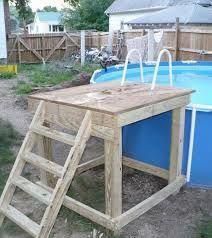 an above ground swimming pool with ladder to the side