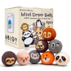 several different types of balls with faces on them in front of a box and packaging