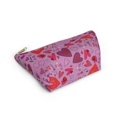 a pink and red bag with hearts on it