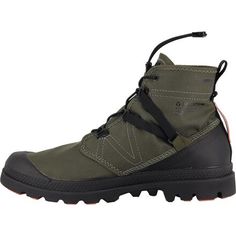 a pair of green hiking boots with black laces on the side and an orange sole