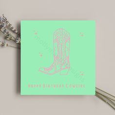 a greeting card with a cowboy boot on it