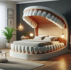 a modern bedroom with an unusual bed and lights on the headboard, along with other furniture