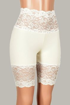 Elegant Fitted Above Knee Shorts, Elegant Fitted Above-knee Shorts, White Lace Patchwork Bottoms For Spring, Fitted White Bottoms With Lace Patchwork, White Bottoms With Lace Patchwork For Spring, High Waist Lace Bottoms With Lace Trim, Elegant Stretch Bottoms With Lace Patchwork, High-waist Bottoms With Lace Trim, White Stretch Bottoms With Contrast Lace