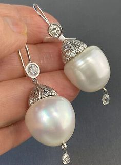 HUGE 14K White Gold 18 South Sea Baroque Pearl Diamond Filigree Duster Earrings | eBay Luxury Pear-shaped High Luster Pearl Earrings, Luxury High Luster Pear-shaped Pearl Earrings, Formal White High Luster Pearl Earrings, Oval High Luster Pearl Earrings For Formal Events, Exquisite White Pearl Earrings For Evening, Formal High Luster Oval Pearl Earrings, Elegant Baroque Jewelry For The Opera, Luxury Briolette Pearl Earrings, Luxury Pear-shaped Pearl Earrings