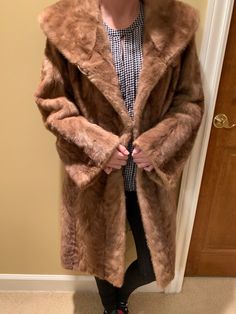 Super stunning fur jacket made by Furs of Perlstein in Chicago. Super pretty interior design as well. Has only one button (not missing any, just only has a middle button). In great condition. Model is 5'2 and 115 pounds and it's a bit loose and long in the arm section. Formal Faux Fur Outerwear In Mink Color, Formal Mink Outerwear With Faux Fur Lining, Classic Mink Outerwear With Faux Fur Lining, Vintage Formal Outerwear In Mink Color, Vintage Fur Coat For Winter Formal Occasions, Vintage Fur Coat For Winter Formal, Vintage Fur Coat For Formal Winter Occasions, Classic Mink Faux Fur Coat, Vintage Winter Fur Coat For Formal Occasions