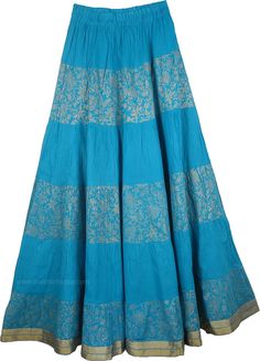 Blue Cotton Crisp Tall Skirt - This is a very crisp and crinkled summer long skirt with gold brocade-lace work and gold pattern in hand block print. The high quality long cotton skirt has an elastic waist and is half lined for a graceful full fit. The hemline is accentuated by a golden ribbon. This skirt surely looks beautiful with its golden highlights in the beautiful blue (see detailed picture below). Top it with a sexy cami in a light color (may be white) and it gives you a designer flair wi Festive Long Blue Skirt, Traditional Blue Maxi Skirt, Traditional Blue Flowy Maxi Skirt, Traditional Long Blue Skirt, Traditional Blue Skirt For Festivals, Traditional Blue Flowy Skirt, Traditional Flowy Blue Skirt, Summer Long Skirt, Long Cotton Skirt