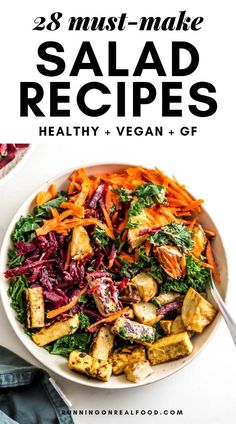 beet carrot kale salad with tofu and roasted potatoes in a white bowl