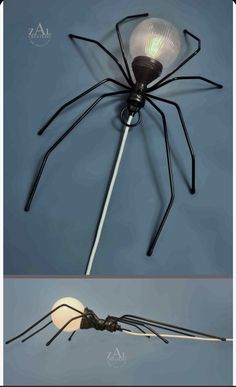 a spider lamp that is on top of a light pole and the bottom has a wire attached