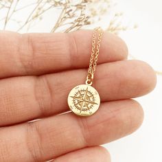 "GOLD COMPASS necklace | Compass Rose Gifts for Travel Lovers | Globetrotter Necklace | Compass Pendant Long distance friendship Going away This gorgeus gold compass necklace is so dainty! has a compass shaped pendant - all made of gold plated over 925 sterling silver. A beautiful, dainty charm that is engraved very clearly. This wonderful sun compass necklace , is perfect to wear as everyday jewelry or for your special moments. You can combine it with other minimalist necklaces to get the perfe Gold Compass Necklace, Minimalist Necklaces, Rose Gifts, Distance Friendship, Long Distance Friendship, Compass Pendant, Compass Necklace, Dragon Necklace, Compass Rose