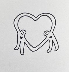 two people holding hands in the shape of a heart on white paper with black ink