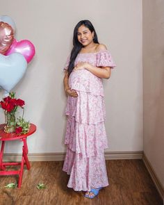 A floral print chiffon maternity maxi dress featuring a square neckline, a smocked elastic top, short puff sleeves, a ruffle layered skirt and double lined. Maternity Maxi Dress, Elastic Top, Maternity Maxi, Floral Print Chiffon, Floral Squares, Pregnancy Maxi Dress, Pink Blush Maternity, Layered Skirt, Neck Ruffle