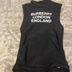 Classic One Piece Design Girls Bathing Suit. All Black With White Words: Burberry London England. Size 12. Perfect Condition. Black Logo Print Swimwear For Summer, Burberry Bathing Suit, Burberry Swimsuit Black Women, Luxury Black Sleeveless Swimwear, Burberry Swimsuit Blue, Design Girl, Burberry London, One Piece Swim, Kids Swimming