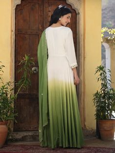 This is a beautiful 2-piece set. The set comes with hand embroidery anarkali kurta has round neck, 3/4th sleeves, ankle length & teamed organza dupatta. Total No of Set-2 Kurta Fabric: Viscose Muslin Dupatta Fabric-Organza Work Done on Kurta- Hand embroidery detailing. Kurta Length-Ankle Length Sleeve Length: 3/4th Sleeves Neck: Round Neck Style: Anarkali Color: Green, White & Ombre Occasion: Party Wear Washing Instructions: Hand Wash or Dry Clean Green Cotton Palazzo Set With Embroidered Border, Floor-length Cotton Kurta With Chikankari Embroidery, Floor-length Embroidered Kurta, Summer Anarkali Dress With Cutdana, Summer Anarkali Dress With Cutdana Details, Summer Anarkali Palazzo Set With Cutdana, Summer Anarkali Long Kurta, Summer Long Anarkali Kurta, Designer Green Dress With Embroidered Border