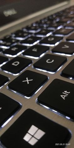 a close up view of the keys on a laptop