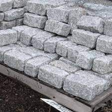 a pile of rocks sitting on top of a wooden pallet