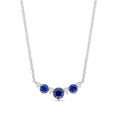 Mark any special occasion with the regal look of this gemstone and diamond necklace. Sterling silver At the center, a deep 5.0mm natural blue sapphire is flanked by round diamonds and 4.0mm blue sapphires 1/6 ct. t.w. of diamonds 18.0-inch rolo chain; lobster claw clasp Blue Diamond Gemstone Necklace For Anniversary, Blue Gemstone Diamond Necklace For Anniversary, Timeless White Gold Lab-created Sapphire Jewelry, Fine Jewelry With Sapphire And Single Cut Diamonds, Blue Diamond Necklace For Anniversary, Timeless Sapphire Jewelry With Diamond Accents, Classic Round Cut Diamond Necklace With Gemstones, Sapphire Diamond Necklace For Formal Occasions, Formal Sapphire Diamond Necklace In Fine Jewelry Style