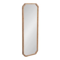 a large wooden mirror on a white background