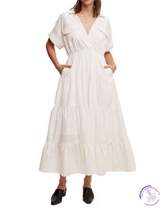 Feel effortlessly chic in our Collared Poplin Maxi Dress! The surplice neckline and tiered skirt add a touch of elegance, while the elastic waist and hidden side pockets provide practicality. With a lined design and clean hem, this dress is perfect for any occasion. Embrace comfort and style in this must-have dress! Material: 100% Cotton Elegant Tiered Cotton Midi Dress, White V-neck Tiered Casual Dress, Summer Tiered Dresses With Pockets, Tiered Summer Dresses With Pockets, Cotton V-neck Dress With Gathered Waist, Spring Tiered Dress With Pockets, Chic Tiered Skirt Dress With Gathered Waist, Spring Tiered Skirt Dress With Pockets, Spring Dresses With Pockets And Tiered Skirt