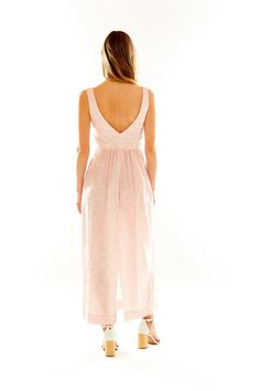 The Mary Alex Dress is a spinoff of a piece Lucy designed as a bridesmaid dress for her sister's wedding. The goal of this silhouette was to be extremely universal but endlessly sophisticated, allowing women to wear the dresses time and time again. Because it was such a hit, we decided to introduce it with a more casual cotton poplin, making it a summertime staple. Crafted in our best-selling Liberty Primrose Pink motif, this square neck, sleeveless, ankle-length dress features a fitted bodice w Feminine V-neck Maxi Dress With Fitted Bodice, Feminine V-neck Gown For Spring, Feminine V-neck Spring Gown, Long Dress With Tie Back And Fitted Bodice, Tie-back Maxi Dress With Fitted Bodice, Chic Dresses For Bridal Shower In Spring, Summer V-neck Gown With Fitted Bodice, Sleeveless Summer Bridal Shower Dress, Sleeveless Summer Dress For Bridal Shower