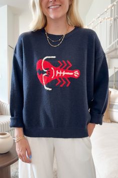 A dreamy and fun knit sweater! The You're My Lobster Sweater is a the perfect lightweight sweater for fall. Featuring a navy color, lobster motif, knit fabric and a true to size fit. Style this cozy knit with red shorts or pants for a fun, fall look! Details & Sizing Navy color Lobster motif Knit fabric True to size fit Gabriella is wearing a size S Fabric 52% Acrylic 18% Polyester 18% Nylon 10% Wool 2% Spandex Shipping & Returns We offer free ground shipping on USA domestic orders. We do not of Lobster Sweater, You're My Lobster, My Lobster, Spend Money, Cozy Knit, Red Shorts, Lightweight Sweater, Sweater Set, Cool Sweaters