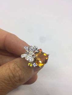 Unusual cut of citrine Sterling Filigree gold finished Setting Handmade Size 9.25 Can be resized All rings are shipped in a nice gift box. Check out our over a THOUSAND great reviews Engraving is $4 per letter and is not always perfect depending on the piece. It can take a few days if the jeweler is busy. This is payable to Paypal Judithsltd@gmail.com Yellow Topaz Ring With Prong Setting As Gift, Sterling Silver Yellow Gold Topaz Ring Gift, Yellow Gold Topaz Ring In Sterling Silver Gift, Orange Oval Topaz Ring For Gift, Oval Orange Topaz Ring For Gift, Orange Oval Topaz Ring Gift, Oval Orange Topaz Ring Gift, Topaz Open Ring Jewelry Gift, Citrine Open Ring Jewelry Gift