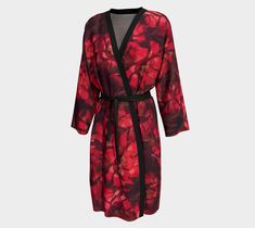 Exclusively unique, the dark red Peony mid calf length kimono robe by Silk Takuyo is born from vibrant Hawaiian Nature infused with elegant Japanese design. This pretty deep jewel tone red Japanese kimono robe makes a glam cover up for a dinner party, travel or at a beach. This kimono robe is a made to order item, once your order comes in, your new kimono will be printed, sewn and shipped within 2-2.5 weeks, depending on the volume of your order. * Gift Wrap is NOT available for this item. * the Elegant Kimono With Kimono Sleeves As A Gift, Elegant Kimono With Kimono Sleeves For Gift, Elegant Red Kimono For Spring, Elegant Kimono As A Gift, Elegant Red Spring Kimono, Elegant Red Wrap Kimono, Elegant Long Red Robe, Luxury Elegant Red Kimono, Red Silk Summer Kimono