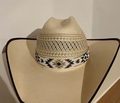 Casual Beaded Hat Bands For Festivals, Casual Woven Hat Bands For Festivals, Casual White Hat Bands For Festivals, Casual Beige Hat Bands For Festival, Western Cream Adjustable Straw Hat, Casual Cream Hat Bands For Rodeo, Casual Beaded Hats With Flat Brim, Casual Beaded Flat Brim Hat, White Southwestern Hat Bands For Summer