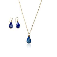 SODALITE JEWELRY SETThis delicate, teardrop Sodalite jewelry set is the epitome of understated beauty, making it the perfect gift for women any day of the year.The dainty necklace and earrings set is comprised of genuine indigo blue Sodalite stones. Choose either Sterling Silver 925 or 14K Gold fill as your finish. Also choose your chain length: 16 inches, 18 inches or 20 inches.The small and lightweight Sodalite stones are set in a lovely teardrop shape and are expertly wire wrapped by hand. Pl Blue Drop Jewelry With Natural Stones, Blue Teardrop Pendant Jewelry With Natural Stones, Blue Teardrop Pendant With Natural Stones, Sapphire Teardrop Jewelry With Natural Stones, Teardrop Sapphire Jewelry With Natural Stones, Blue Lapis Lazuli Teardrop Jewelry, Blue Teardrop Lapis Lazuli Jewelry, Blue Teardrop Necklace With Matching Earrings, Minimalist Blue Teardrop Jewelry