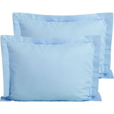 two light blue pillows sitting next to each other