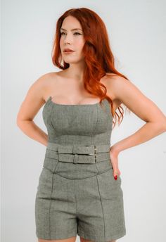 Introducing the epitome of edgy sophistication, our Gray Denim Corset is a daring statement piece designed to redefine your silhouette with bold elegance. Crafted with meticulous attention to detail, this corset is more than an accessory—it's an embodiment of confidence and style. Key Features: Sculpted Sophistication: The scoop neckline, featuring pointed sides at the bust line, adds a touch of avant-garde flair to elevate your look. Embrace the unexpected and make a bold statement. Metal Zippe Modern Fitted Corset Belt For Party, Luxury Fitted Corset Belt, Luxury Corset Belt, Modern Fitted Corset Belt With Belt Loops, Chic Fitted Corset Belt For Party, Chic Boned Bodice Corset Belt For Night Out, Chic Fitted Corset Belt, Chic High Waist Corset With Corset Back, Chic Fitted Corset Belt With Belt Loops