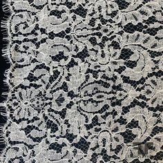 the white lace has been stitched together to make it look like an intricate pattern