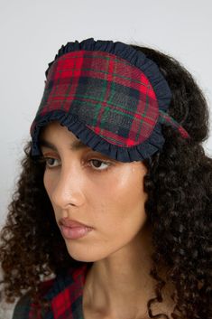 Traditional tartan, with a frilly twist. This Damson pyjama eye mask matches our Antonella set in the same check. • Matching pyjamas available • DM embroidery detail • 100% organic cotton • Designed in London Matching Pyjamas, Organic Quilt, Damson Madder, Reversible Tote Bag, Checked Scarf, Hooded Scarf, Striped Scarves, Red Tartan, Matching Pajamas