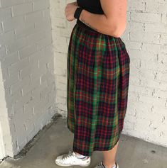 "Adorable high waist skirt is red, blue, yellow, & green plaid print throughout, knee length, metal zip, snap button & hook eye closure on side, fully lined. ( top & shoes not included) Good vintage condition. There is one tiny pin hole that is not noticeable ( see last photo for details) No brand, material or size label Material appears to be wool blend? Fits women's size: XS ( refer to measurements for proper fit) 🌼 Model is 5'4 and measures * 28/33🌼 ( skirt was too small at the Plaid Cotton Lined Skirt Bottoms, High Waist Plaid Pleated Skirt, Plaid Cotton Relaxed Skirt, Green Skirt For Daywear, Plaid Pencil Skirt For Spring, Plaid Pencil Skirt For Spring Season, Casual Plaid Midi Skirt, Plaid Midi Skirt Casual Style, Plaid Full Skirt With Lining