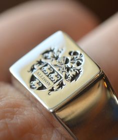 ring; signet ring; family crest ring; monogram ring; monogram signet ring; family ring; crest ring; coat of arms ring; class ring; college ring; university ring; graduation ring; customized jewelry; custom jewelry; personalized jewelry; custom made ring; made to order ring; solid gold ring; solid gold necklace; silver ring; silver necklace; sterling silver jewelry; sterling silver ring; sterling silver necklace; personalized necklace; custom made necklace; Family Crest Ring, Family Crest Rings, Square Face, College Logo, Silver Signet Ring, Upload Image, Square Faces, Shiny Things, Family Crest