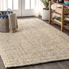 Natural jute fiber and a chunky texture make this handwoven rug a great addition to your home. The solid color works almost anywhere, in both modern or traditional rooms. This rug is reversible for longer wear. JONATHAN Y NATURAL FIBER Pata Fringe 3 X 5 (ft) Jute Light Ivory Indoor Solid Bohemian/Eclectic Area Rug in Yellow | NRF102B-3 Jute Lights, Eclectic Area Rug, Braided Area Rugs, Clean Bedroom, Synthetic Rugs, Natural Area Rugs, Jute Area Rugs, Light Ivory, Bohemian Area Rugs