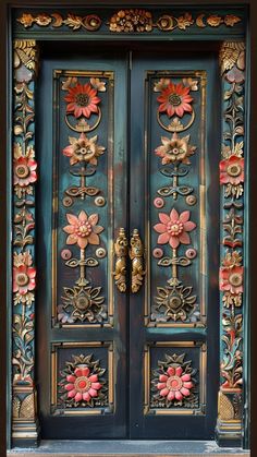 an ornate wooden door with flowers painted on it