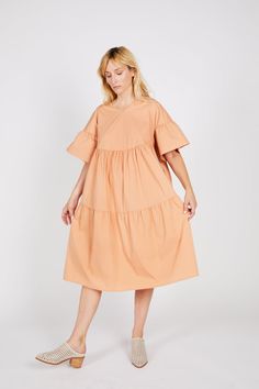 AVERY DRESS peach - Intentionally Blank Spring Midi Dress With Ruffles, Relaxed Fit, Spring Midi Dress With Ruffles And Relaxed Fit, Relaxed Fit Midi Dress With Ruffles For Summer, Relaxed Fit Summer Midi Dress With Ruffles, Summer Midi Dress With Ruffles Relaxed Fit, Oversized Cotton Summer Dress, Oversized Short Sleeve Dress For Brunch, Cotton Midi Dress With Flutter Sleeves For Brunch, Oversized Ruffled Dresses For Spring