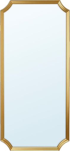 a gold framed mirror on a white wall